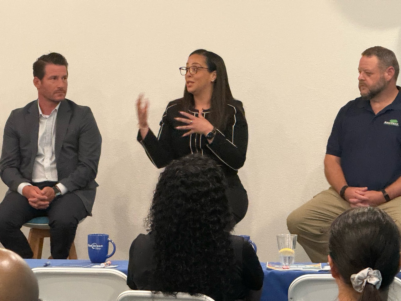 Panelists discussing community questions