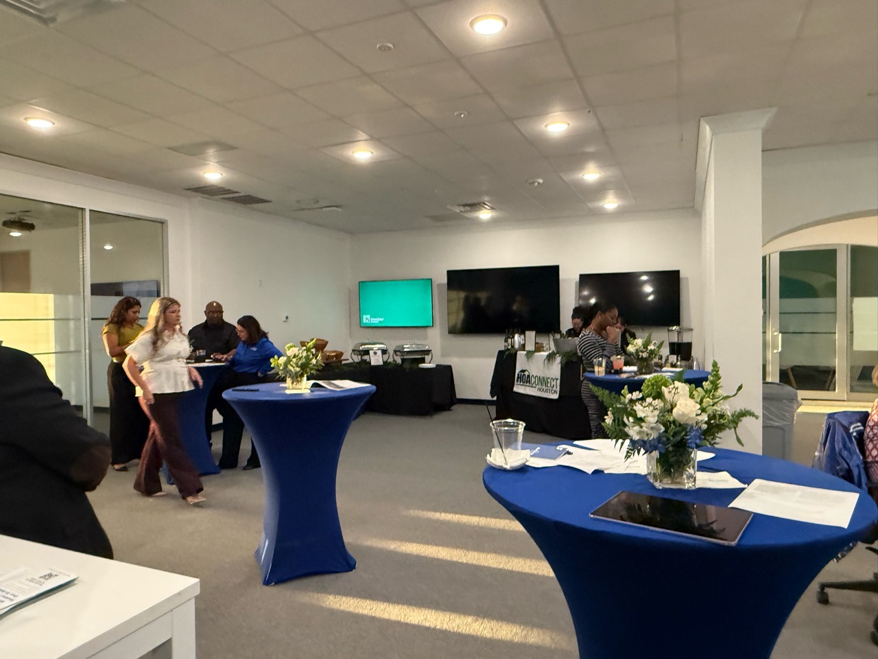 Reception tables and flowers at Blue Stream Fiber